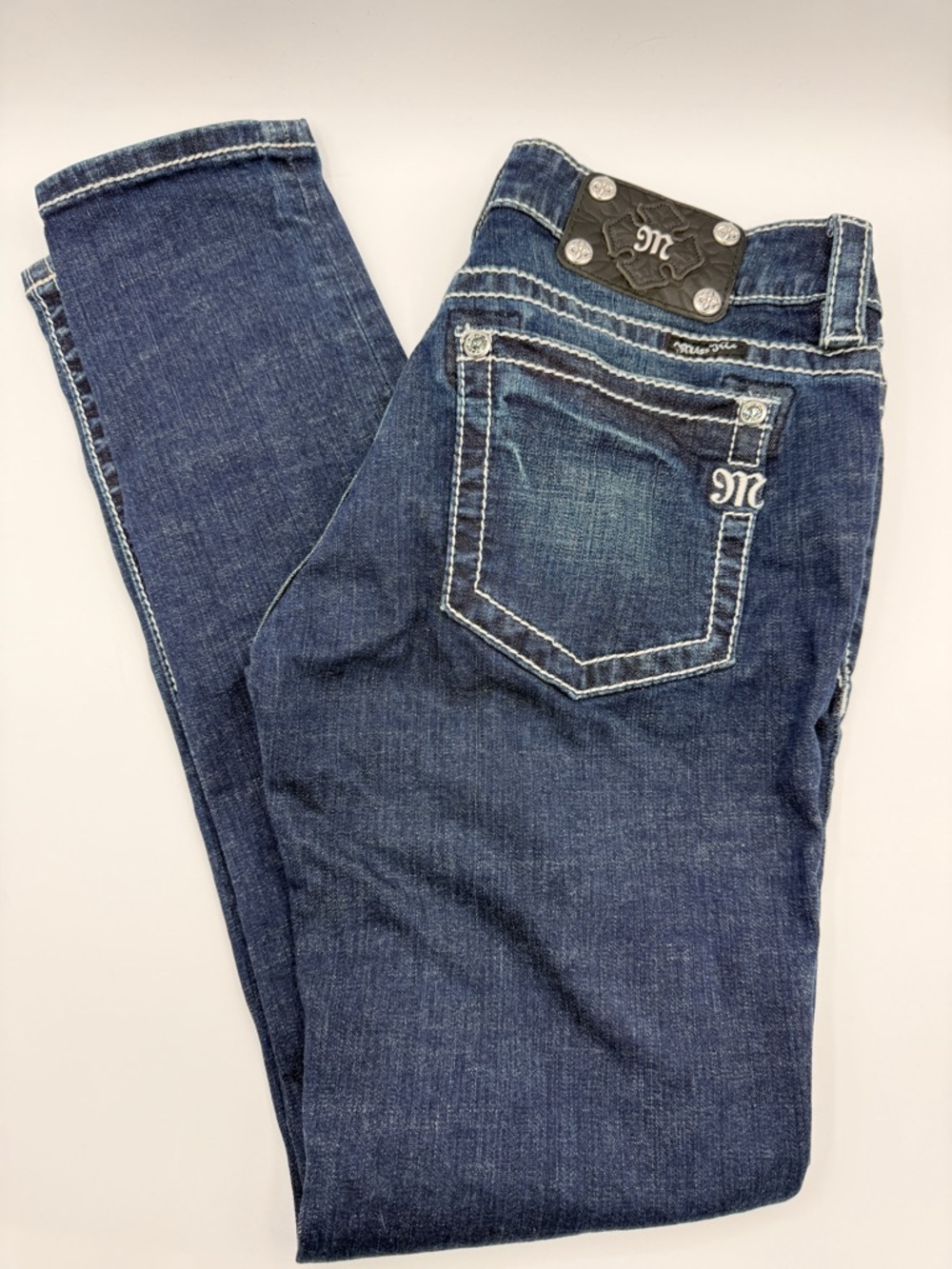 Miss Me Ankle Skinny Dark Blue Denim Jeans with Leather Logo Patch
